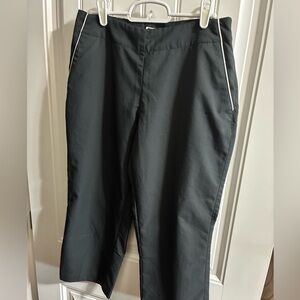 Adidas black size 4 golf capris with side zip and four pockets